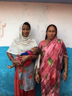 A newly postpartum mother, her baby, and her own mother who was her birth companion and a previous traditional birth attendant